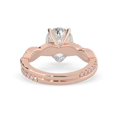 pear brilliant lab grown diamond engagement ring with prong setting and twisted pavé diamond band in rose gold tone