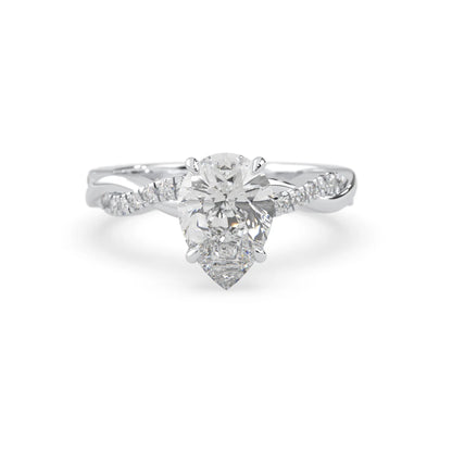 pear brilliant lab grown diamond engagement ring with prong setting and twisted pavé diamond band in white gold tone