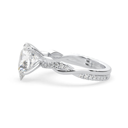 pear brilliant lab grown diamond engagement ring with prong setting and twisted pavé diamond band in white gold tone