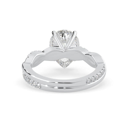 pear brilliant lab grown diamond engagement ring with prong setting and twisted pavé diamond band in white gold tone