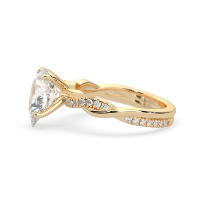 pear brilliant lab grown diamond engagement ring with prong setting and twisted pavé diamond band in yellow gold tone