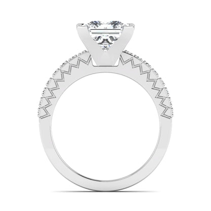 Princess cut lab grown diamond engagement ring featuring a four-prong setting with round accent diamonds on a geometric white gold style band.