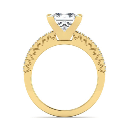 Princess cut lab grown diamond engagement ring featuring a four-prong setting with round accent diamonds on a geometric yellow gold style band.