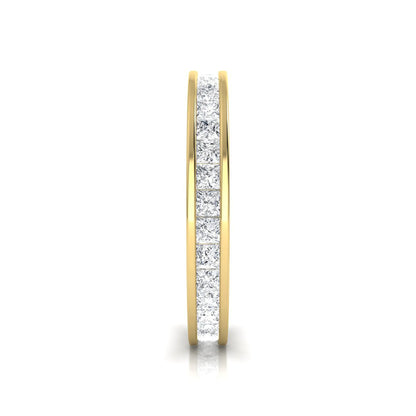 Princess cut channel set lab grown diamond eternity band ring with yellow gold tone design
