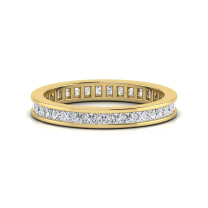 Princess cut channel set lab grown diamond eternity band ring with yellow gold tone design