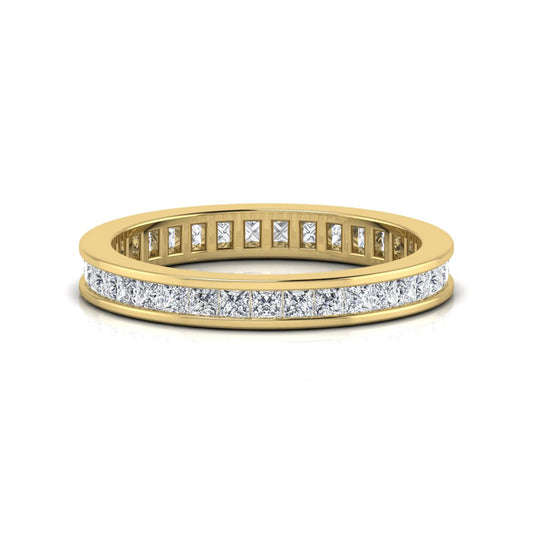 Princess cut channel set lab grown diamond eternity band ring with yellow gold tone design