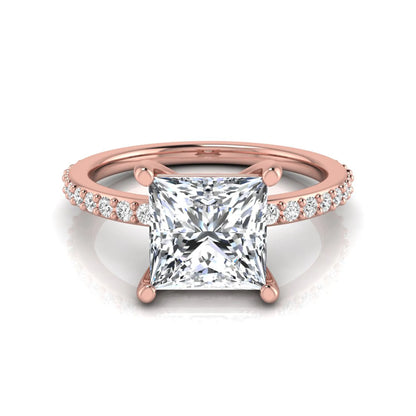 Princess cut four prong lab grown diamond engagement ring featuring a 1.96 carat IGI certified center diamond with round cut pavé diamonds on a classic solitaire band in rose gold