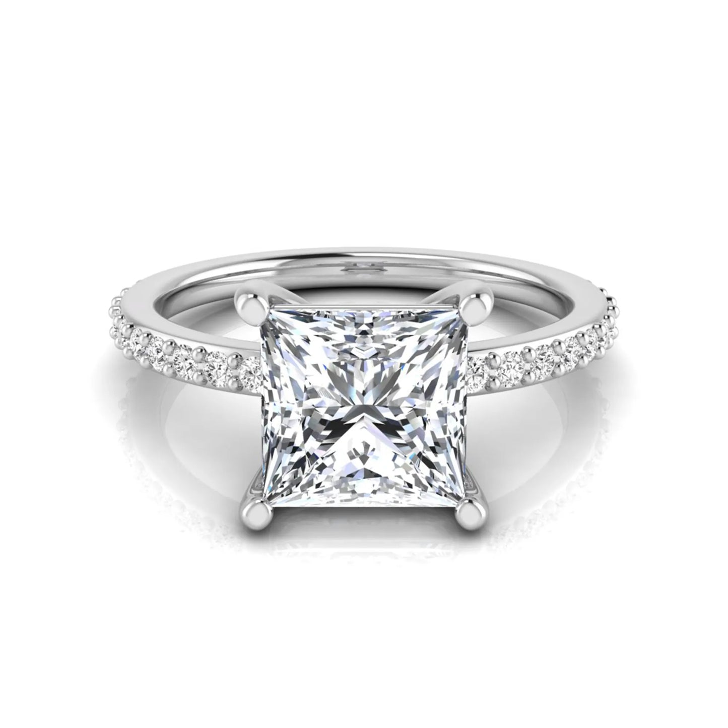 Princess cut four prong lab grown diamond engagement ring featuring a 1.96 carat IGI certified center diamond with round cut pavé diamonds on a classic solitaire band in white gold