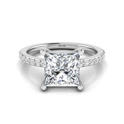 Princess cut four prong lab grown diamond engagement ring featuring a 1.96 carat IGI certified center diamond with round cut pavé diamonds on a classic solitaire band in white gold