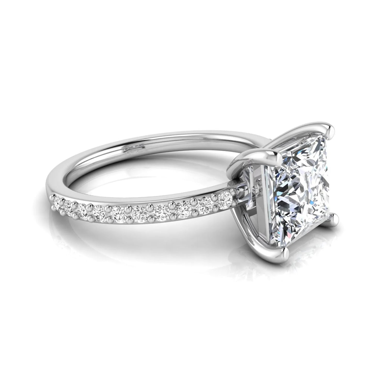 Princess cut four prong lab grown diamond engagement ring featuring a 1.96 carat IGI certified center diamond with round cut pavé diamonds on a classic solitaire band in white gold