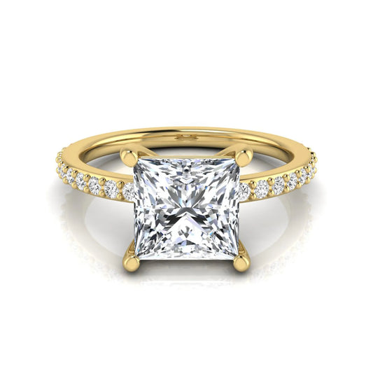 Princess cut four prong lab grown diamond engagement ring featuring a 1.96 carat IGI certified center diamond with round cut pavé diamonds on a classic solitaire band in yellow gold