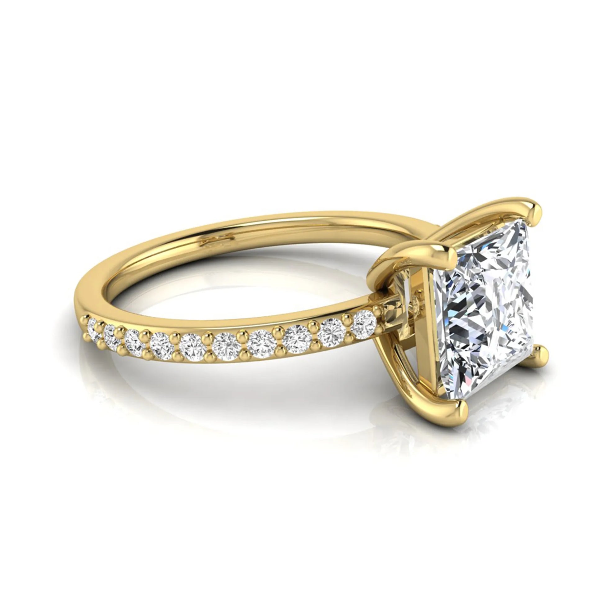 Princess cut four prong lab grown diamond engagement ring featuring a 1.96 carat IGI certified center diamond with round cut pavé diamonds on a classic solitaire band in yellow gold