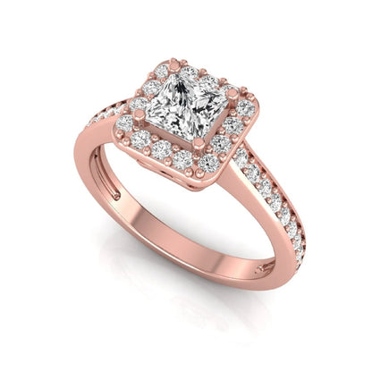 Princess Cut Halo Lab Grown Diamond Engagement Ring featuring a princess cut center diamond surrounded by a round diamond halo with a pavé band in a rose gold tone design.