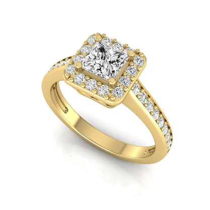 Princess Cut Halo Lab Grown Diamond Engagement Ring featuring a princess cut center diamond surrounded by a round diamond halo with a pavé band in a yellow gold tone design.