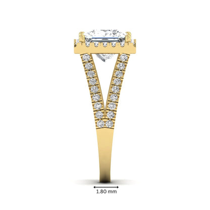 Princess cut halo split shank lab grown diamond engagement ring featuring a 3.01 carat IGI certified princess cut center diamond with round diamond halo in yellow gold.