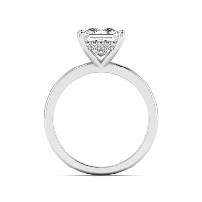 Princess cut lab grown diamond hidden halo solitaire engagement ring with four-prong setting and white gold tone band.
