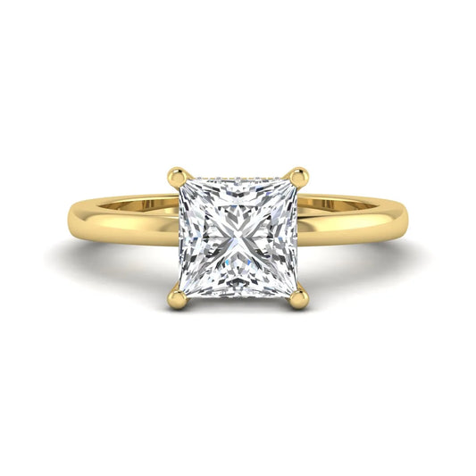 Princess cut lab grown diamond hidden halo solitaire engagement ring with four-prong setting and yellow gold tone band.