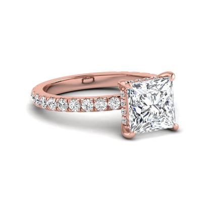 IGI certified princess cut lab grown diamond hidden halo solitaire accent engagement ring with pavé diamond band in rose gold.