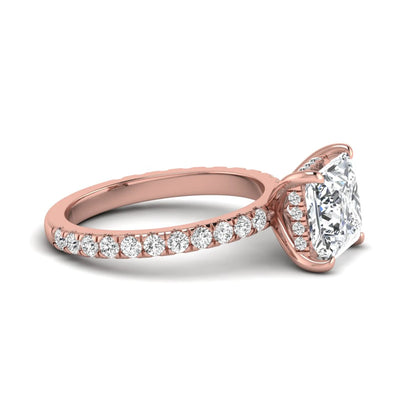 IGI certified princess cut lab grown diamond hidden halo solitaire accent engagement ring with pavé diamond band in rose gold.