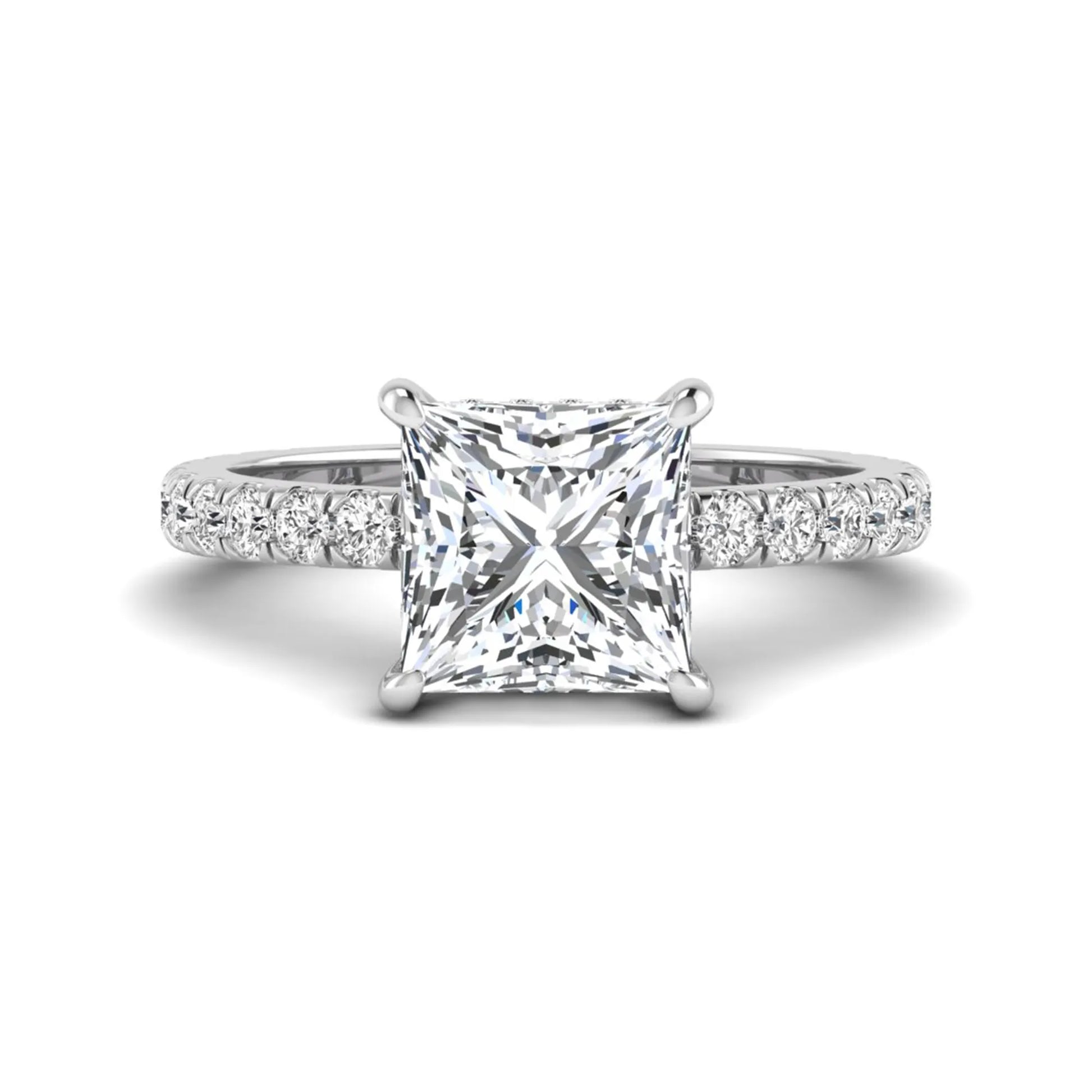 IGI certified princess cut lab grown diamond hidden halo solitaire accent engagement ring with pavé diamond band in white gold.