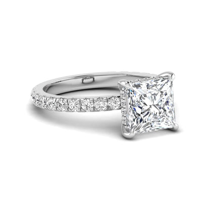 IGI certified princess cut lab grown diamond hidden halo solitaire accent engagement ring with pavé diamond band in white gold.
