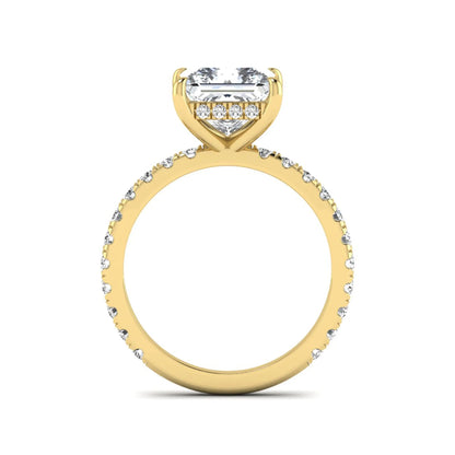 IGI certified princess cut lab grown diamond hidden halo solitaire accent engagement ring with pavé diamond band in yellow gold.