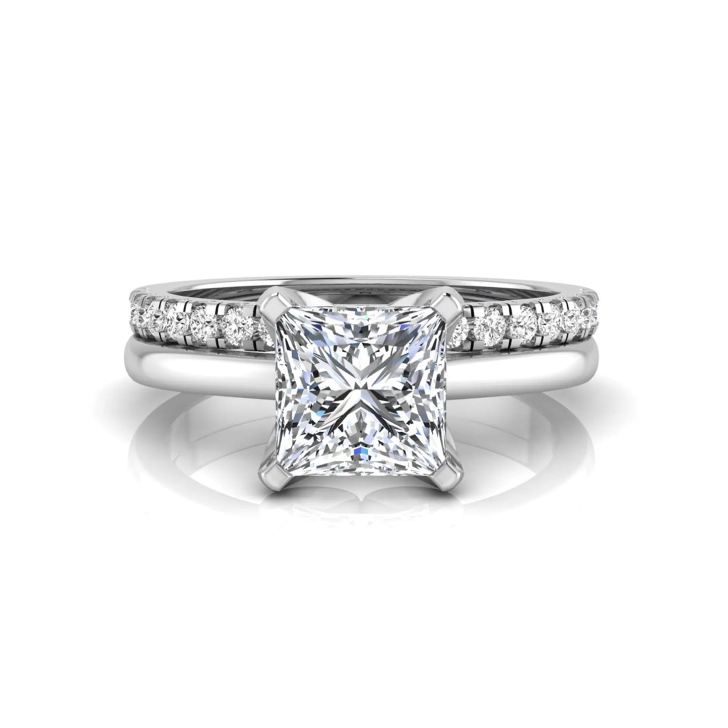 Princess cut lab grown diamond bridal ring set with matching pavé diamond wedding band in white gold.