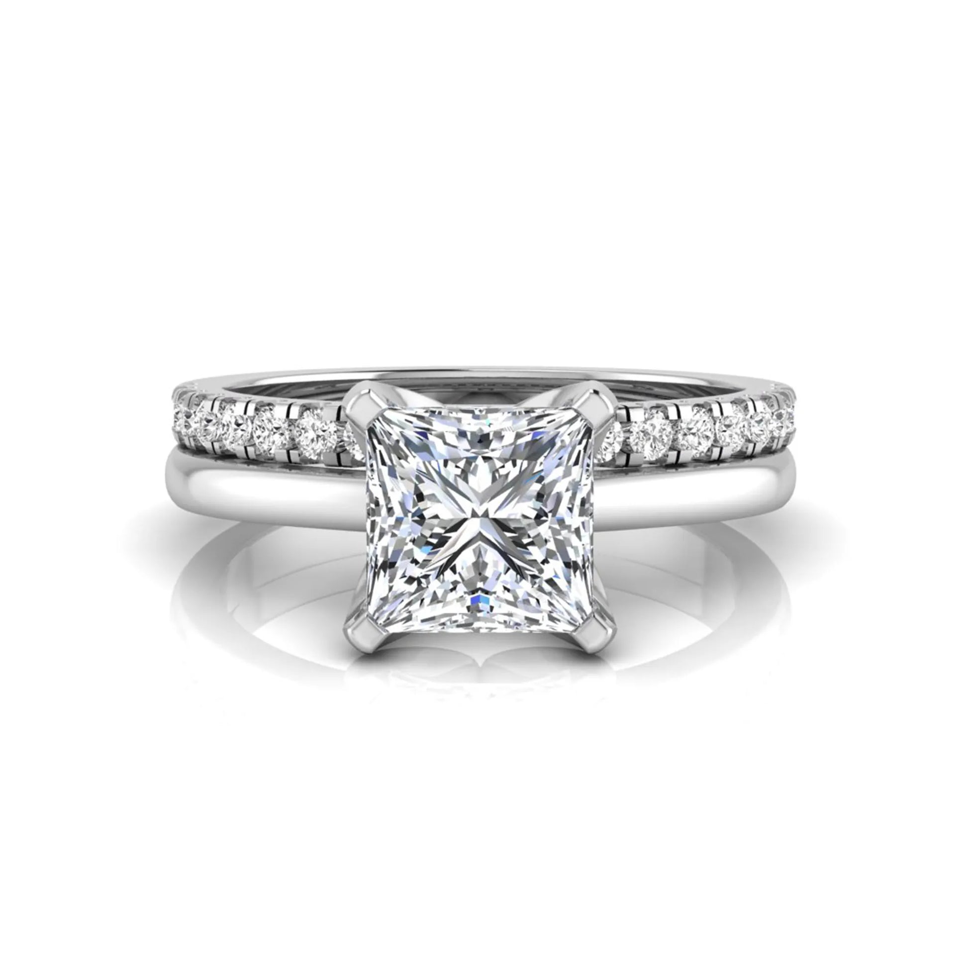 Princess cut lab grown diamond bridal ring set with matching pavé diamond wedding band in white gold.