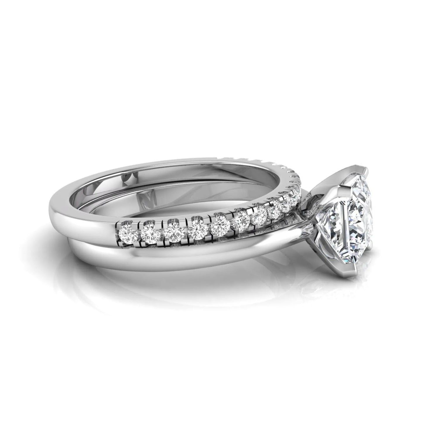 Princess cut lab grown diamond bridal ring set with matching pavé diamond wedding band in white gold.