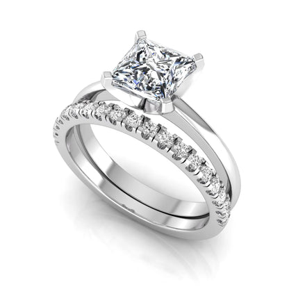 Princess cut lab grown diamond bridal ring set with matching pavé diamond wedding band in white gold.