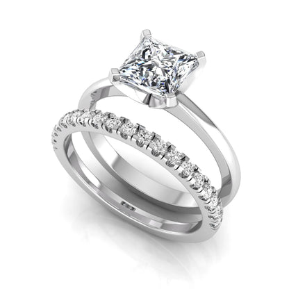 Princess cut lab grown diamond bridal ring set with matching pavé diamond wedding band in white gold.