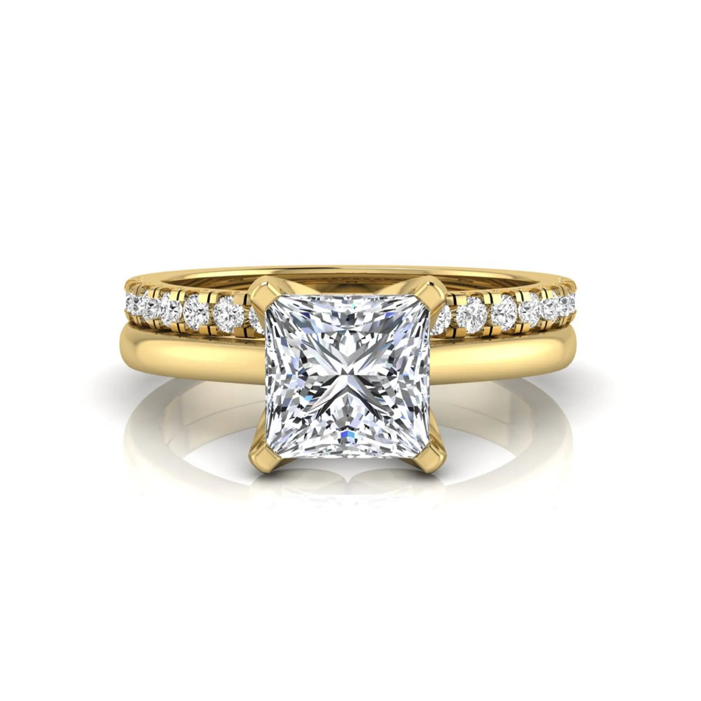 Princess cut lab grown diamond bridal ring set with matching pavé diamond wedding band in yellow gold.