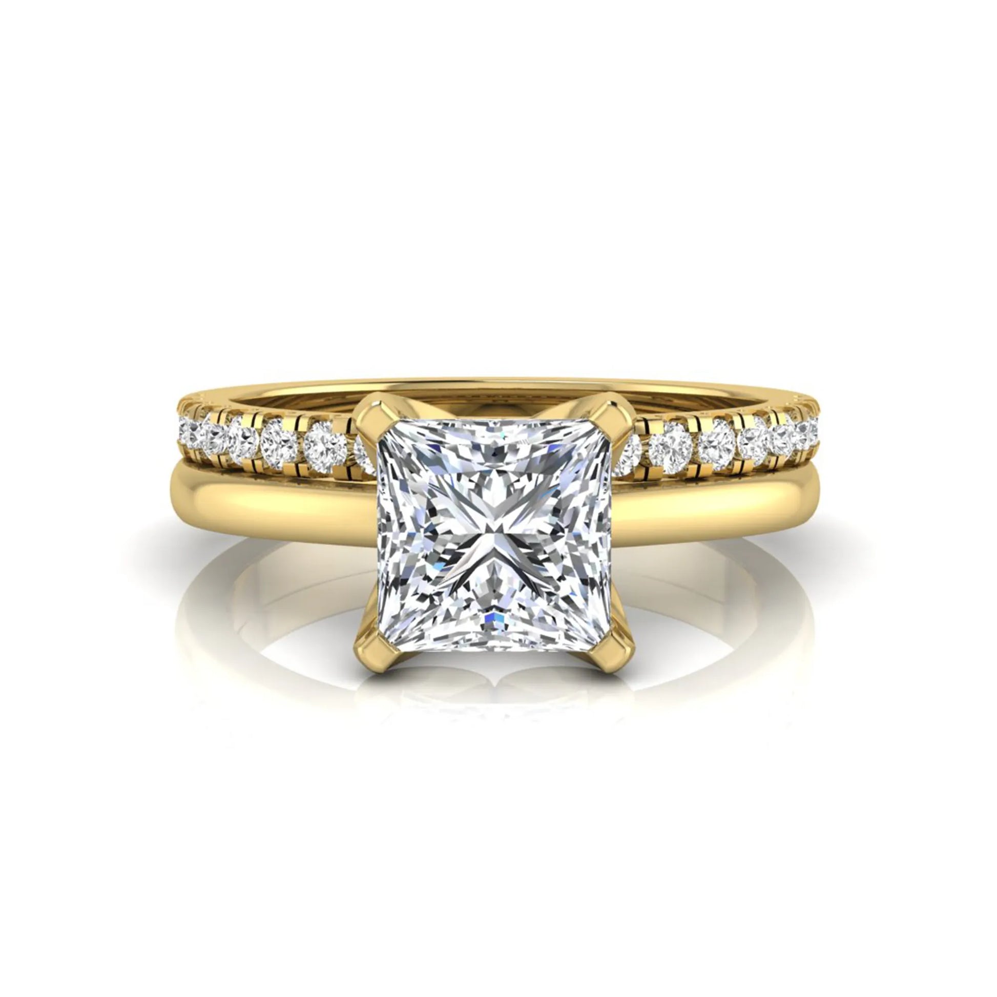 Princess cut lab grown diamond bridal ring set with matching pavé diamond wedding band in yellow gold.
