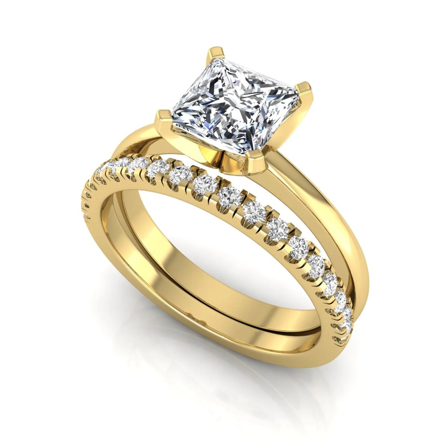 Princess cut lab grown diamond bridal ring set with matching pavé diamond wedding band in yellow gold.