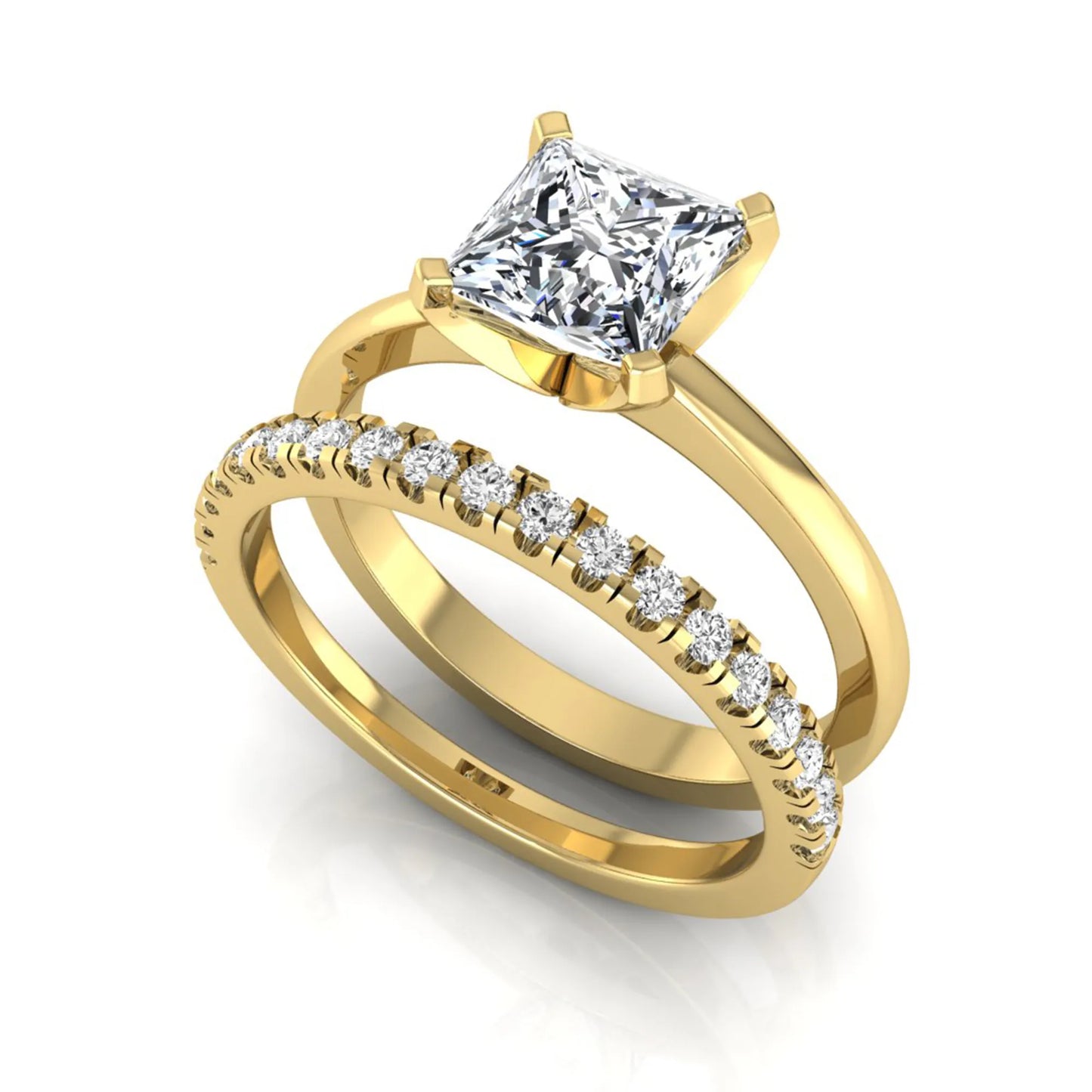 Princess cut lab grown diamond bridal ring set with matching pavé diamond wedding band in yellow gold.