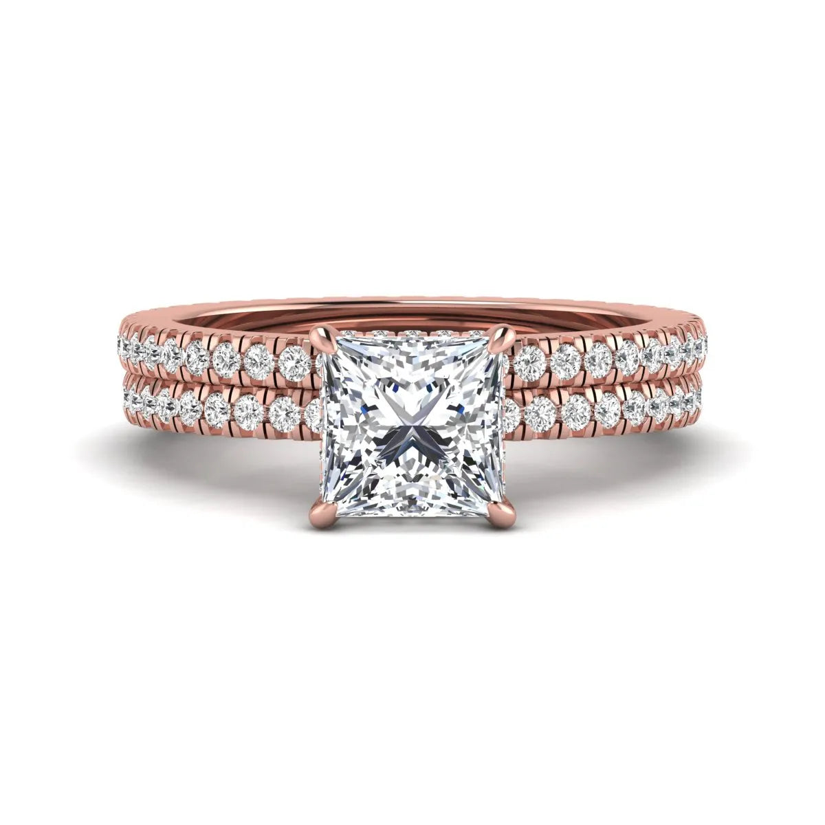 Princess cut lab grown diamond bridal ring set featuring a 1.96 carat IGI certified center diamond, hidden halo engagement ring, and matching round diamond eternity wedding band in rose gold.