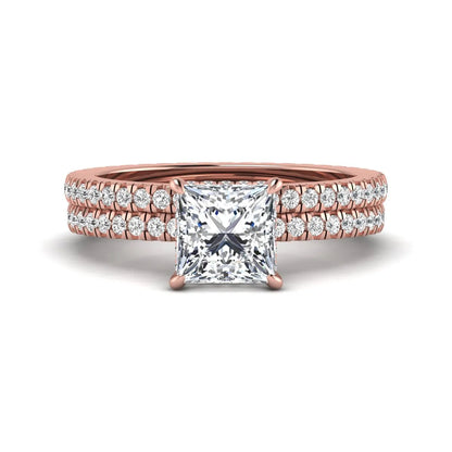 Princess cut lab grown diamond bridal ring set featuring a 1.96 carat IGI certified center diamond, hidden halo engagement ring, and matching round diamond eternity wedding band in rose gold.