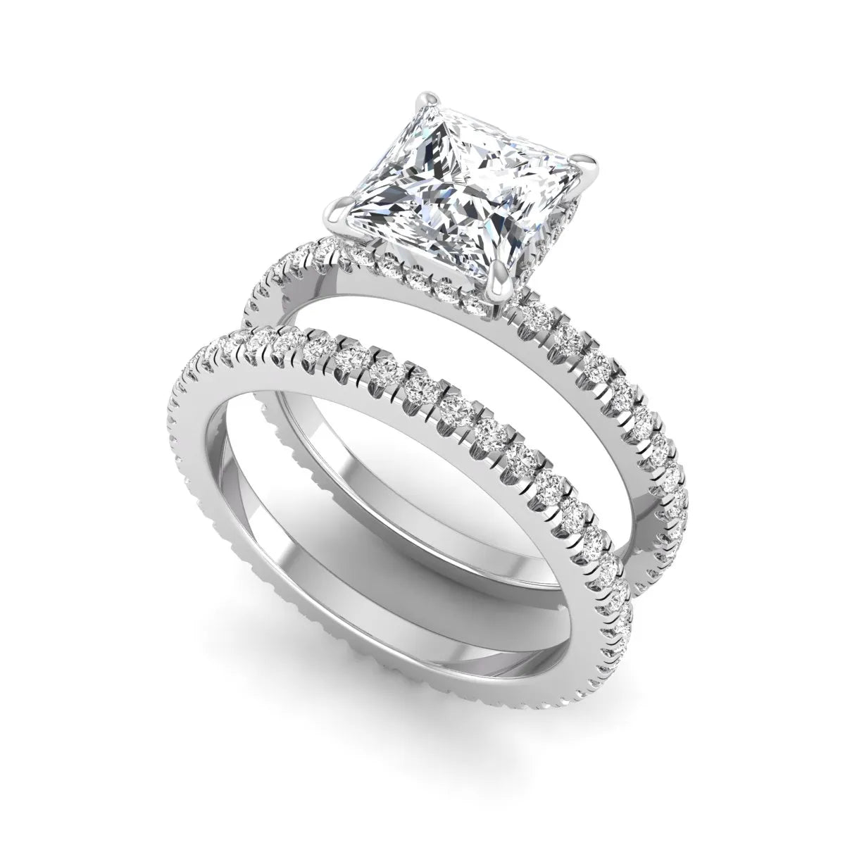Princess cut lab grown diamond bridal ring set featuring a 1.96 carat IGI certified center diamond, hidden halo engagement ring, and matching round diamond eternity wedding band in white gold.