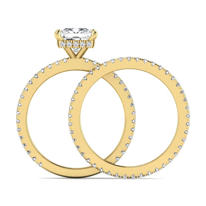 Princess cut lab grown diamond bridal ring set featuring a 1.96 carat IGI certified center diamond, hidden halo engagement ring, and matching round diamond eternity wedding band in yellow gold.