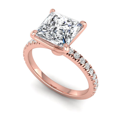 Princess cut lab grown diamond pavé engagement ring featuring a 3.01 carat IGI certified center diamond in rose gold.