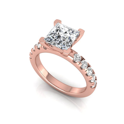 Princess cut lab grown diamond engagement ring featuring a 1.96 carat IGI certified center diamond with round side stone accents in rose gold.
