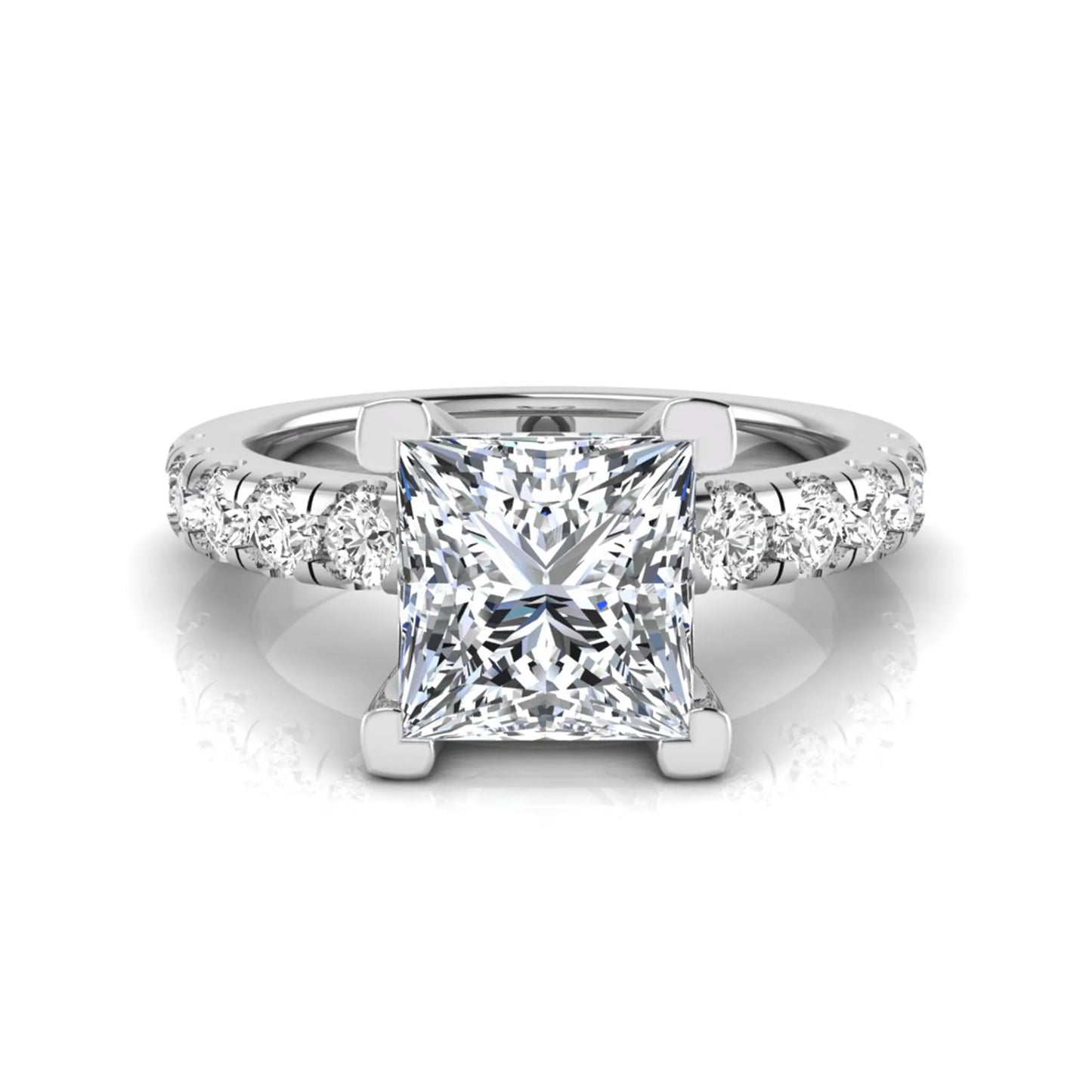 Princess cut lab grown diamond engagement ring featuring a 1.96 carat IGI certified center diamond with round side stone accents in white gold.