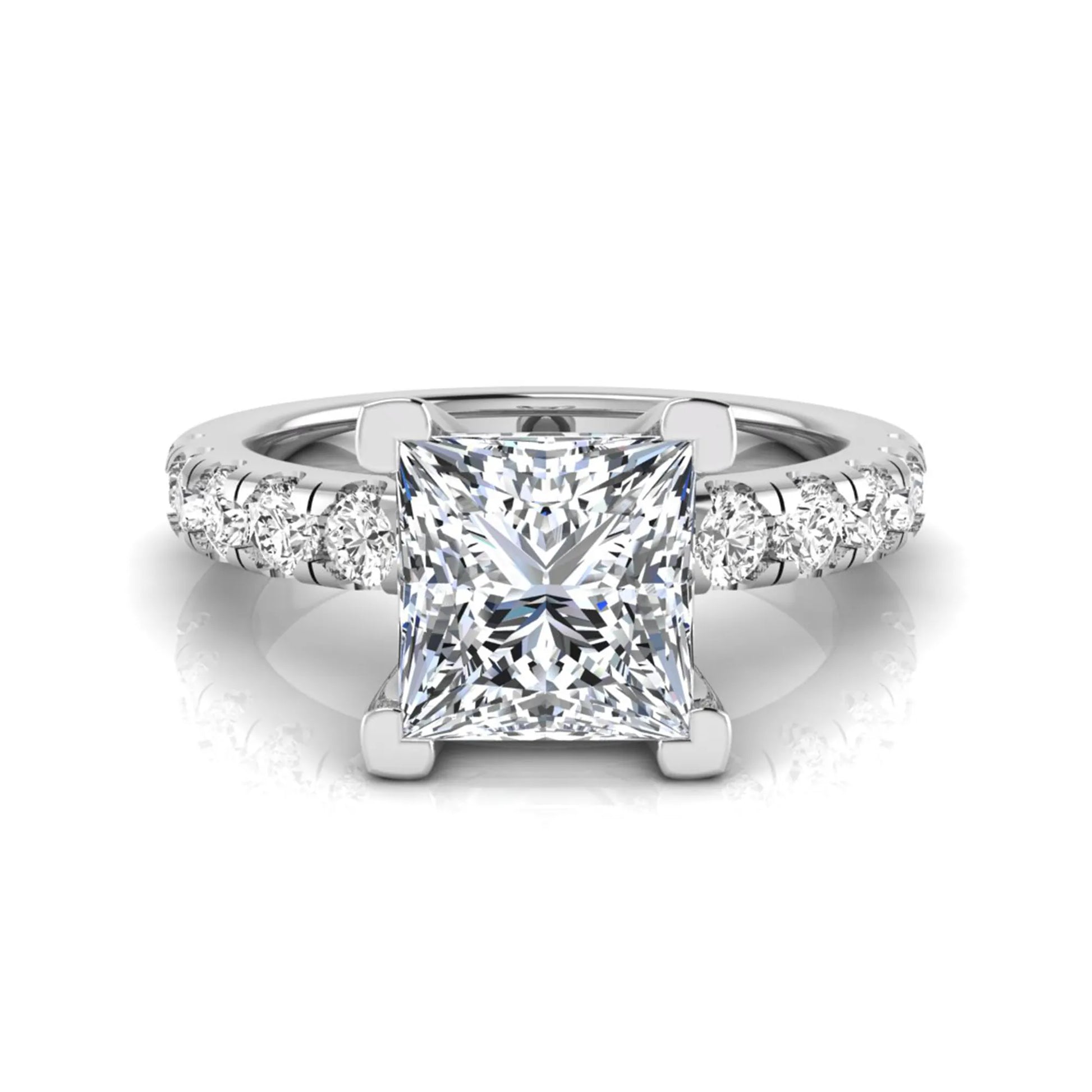 Princess cut lab grown diamond engagement ring featuring a 1.96 carat IGI certified center diamond with round side stone accents in white gold.
