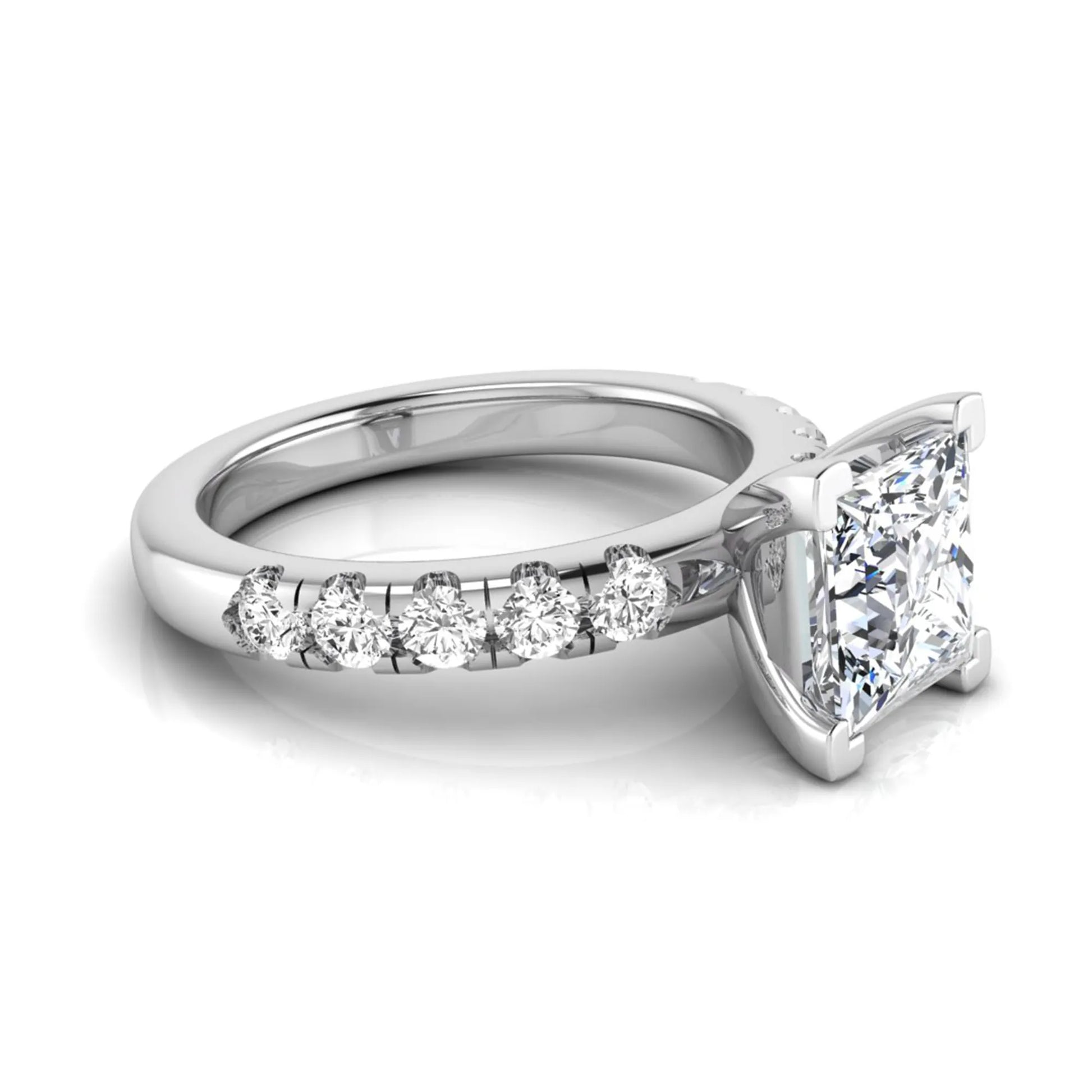 Princess cut lab grown diamond engagement ring featuring a 1.96 carat IGI certified center diamond with round side stone accents in white gold.