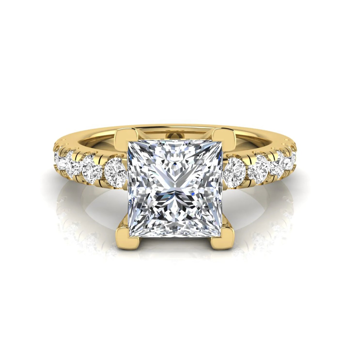 Princess cut lab grown diamond engagement ring featuring a 1.96 carat IGI certified center diamond with round side stone accents in yellow gold.