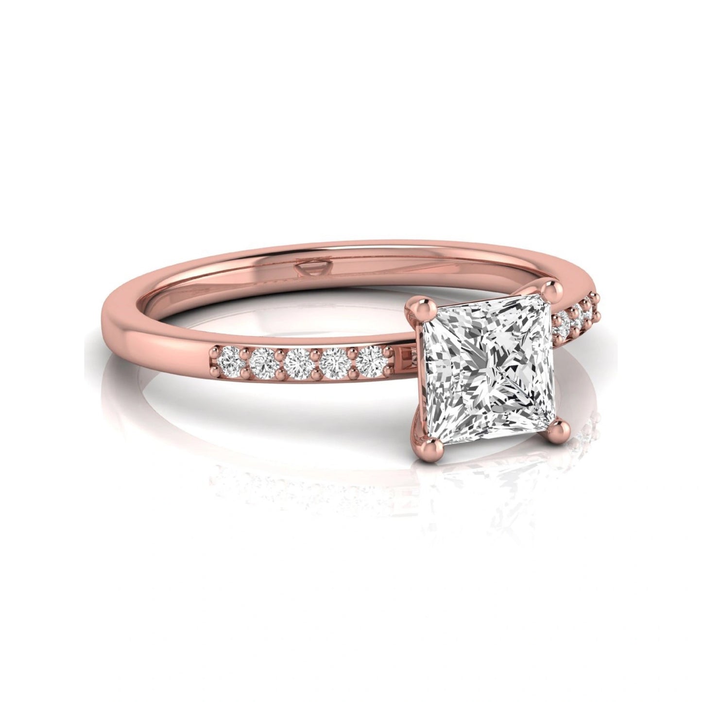 Princess cut lab grown diamond side stone engagement ring featuring a 1.24 carat IGI certified princess cut diamond with pavé round side diamonds in a rose gold setting.