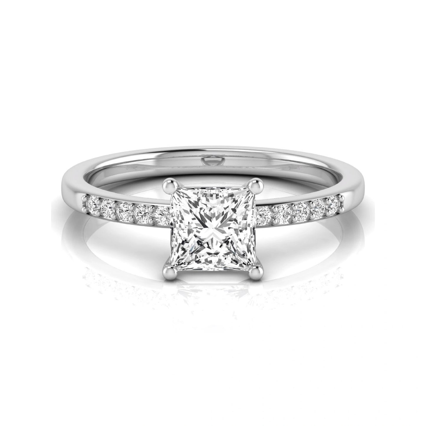 Princess cut lab grown diamond side stone engagement ring featuring a 1.24 carat IGI certified princess cut diamond with pavé round side diamonds in a white gold setting.