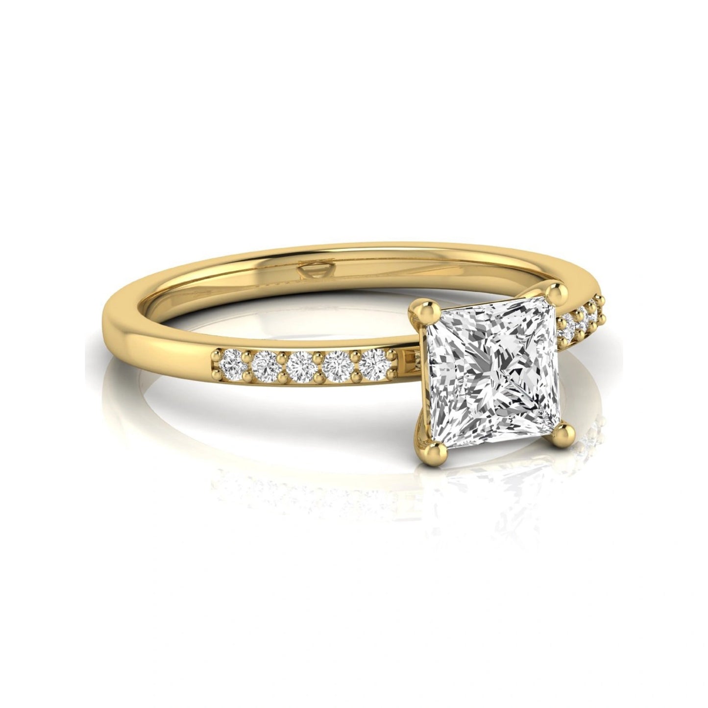 Princess cut lab grown diamond side stone engagement ring featuring a 1.24 carat IGI certified princess cut diamond with pavé round side diamonds in a yellow gold setting.