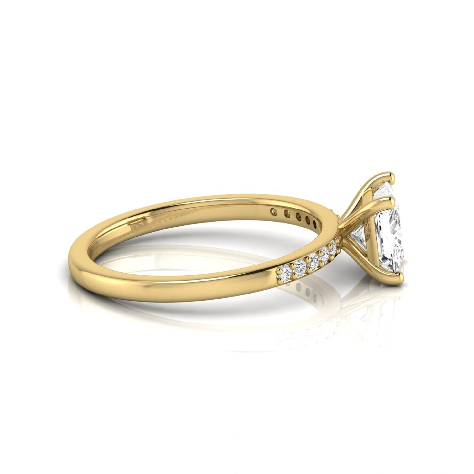 Princess cut lab grown diamond side stone engagement ring featuring a 1.24 carat IGI certified princess cut diamond with pavé round side diamonds in a yellow gold setting.