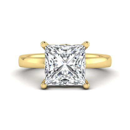 Princess cut lab grown diamond solitaire engagement ring featuring a 3.01 carat IGI certified center diamond in yellow gold.